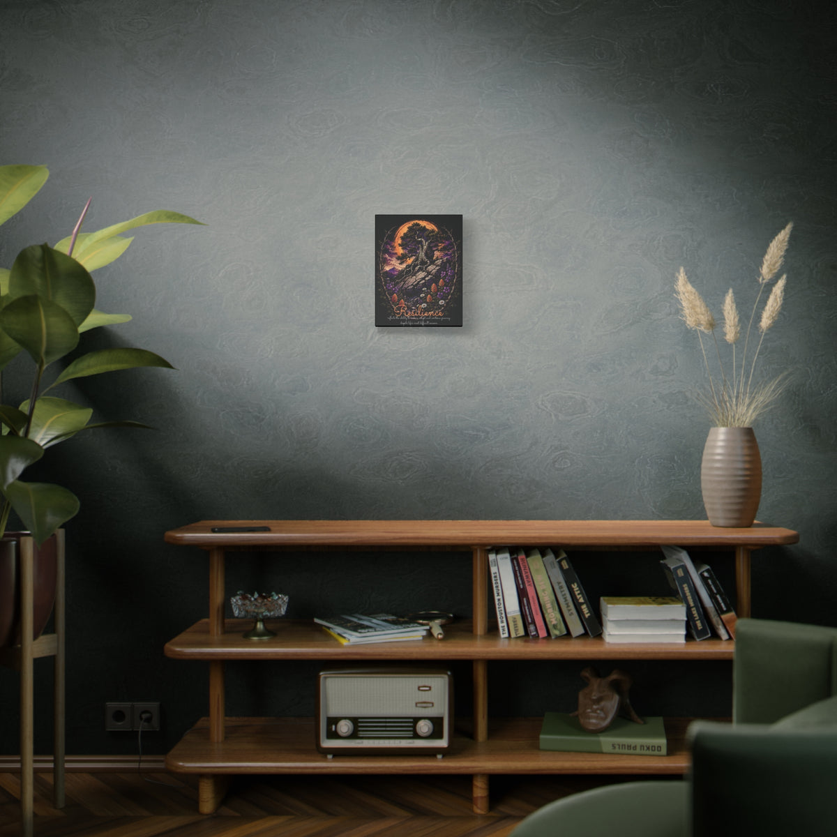 Resilience tree and wildflowers canvas displayed on a gray-green wall above a wooden cabinet