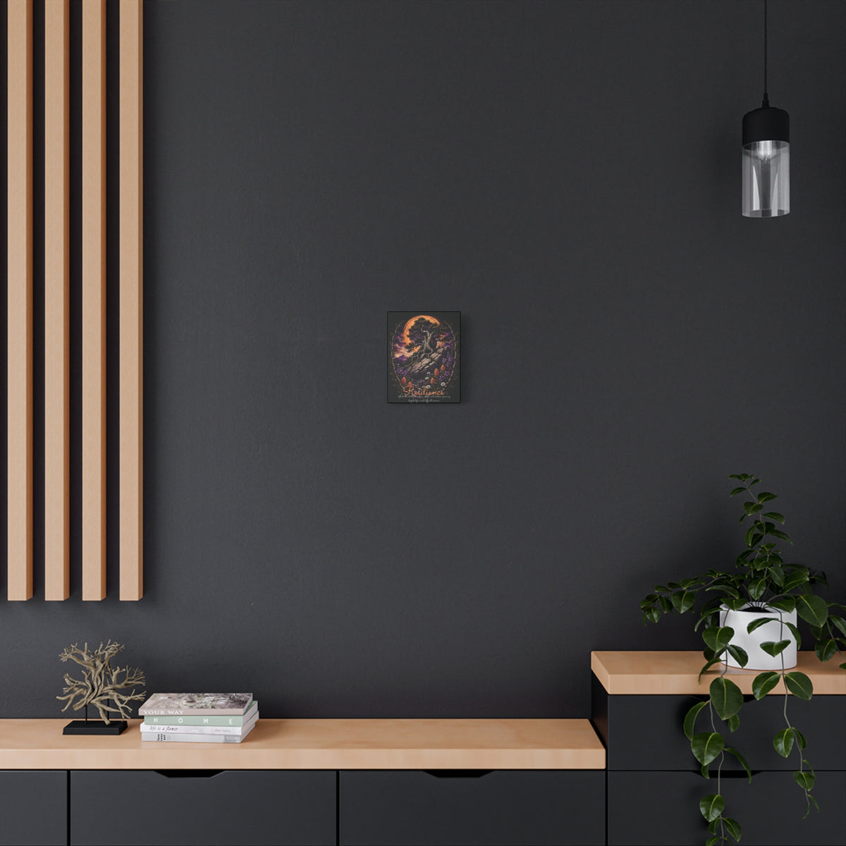 Resilience tree and wildflowers canvas displayed on a dark wall above a wooden console